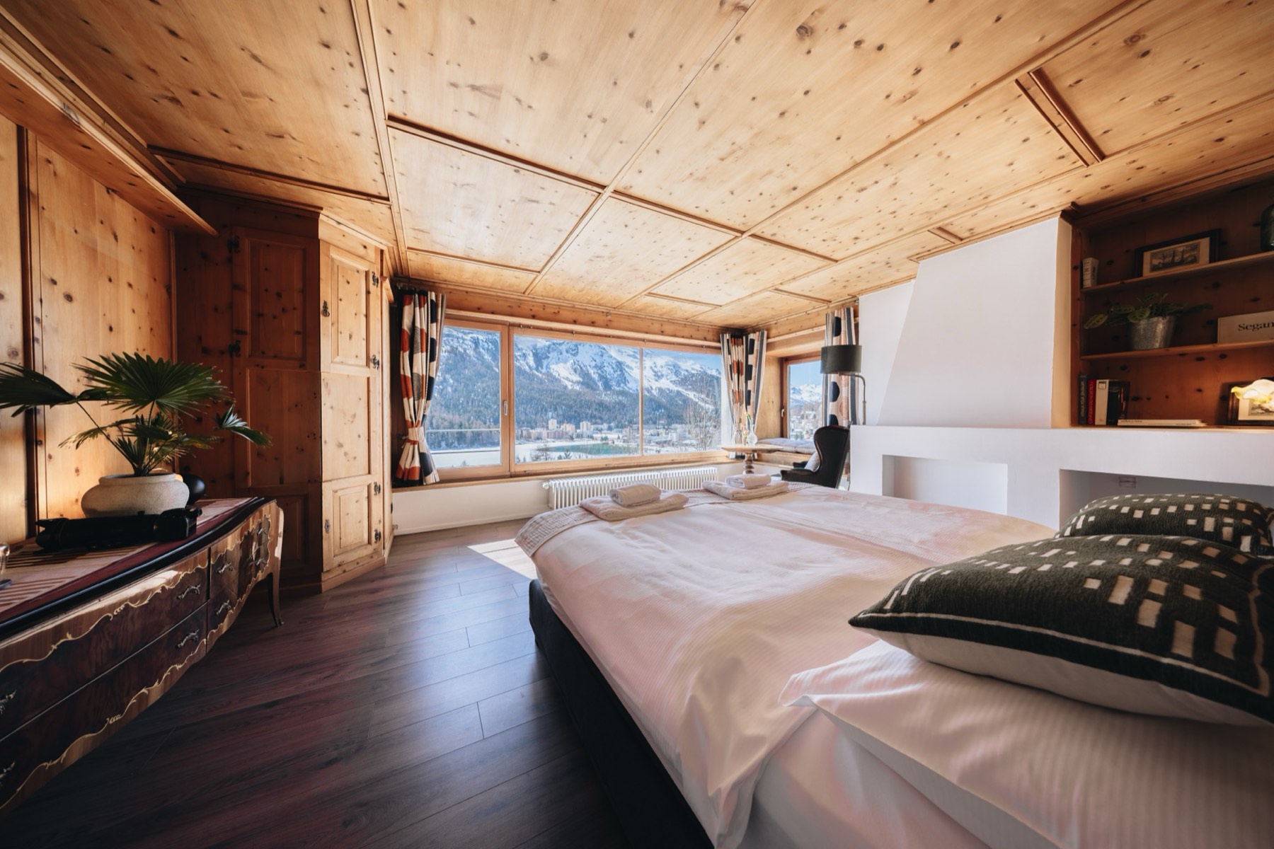Panorama Superior Double at Villa Beaulieu, a top-floor pine room with panoramic lake views